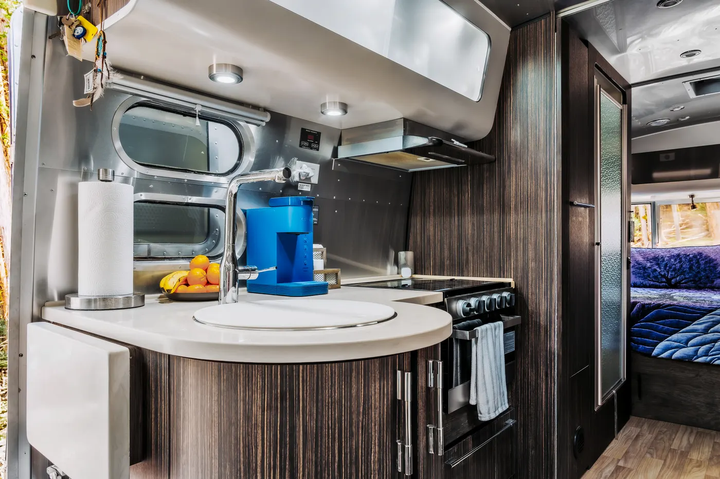 Airstream kitchen with the bedroom beyond