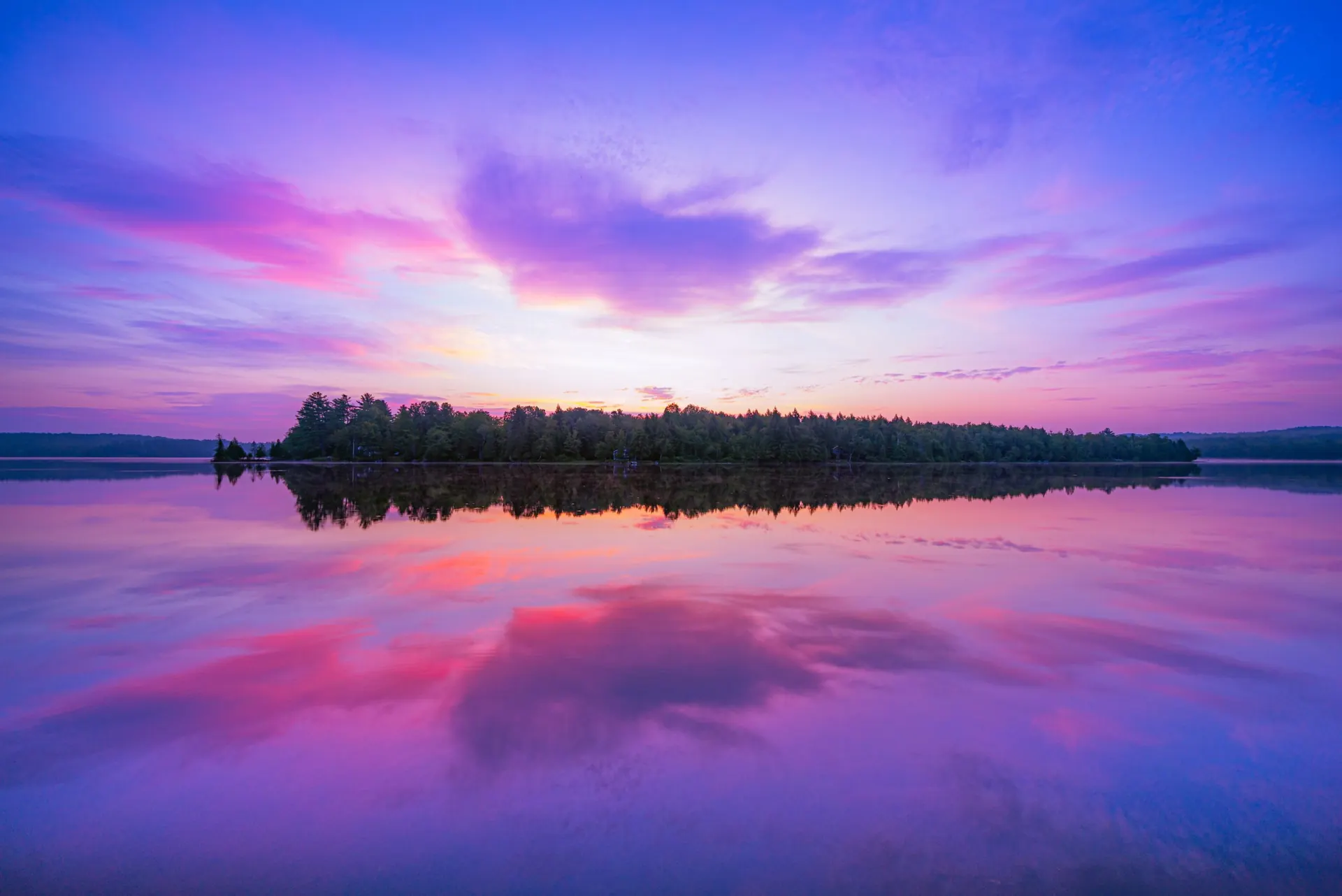 Panoramic view of Manhanock Pond and Dragonwood property in Maine