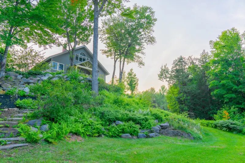 Aerial view of Dragonwood's 18-acre lakefront property in Parkman Maine
