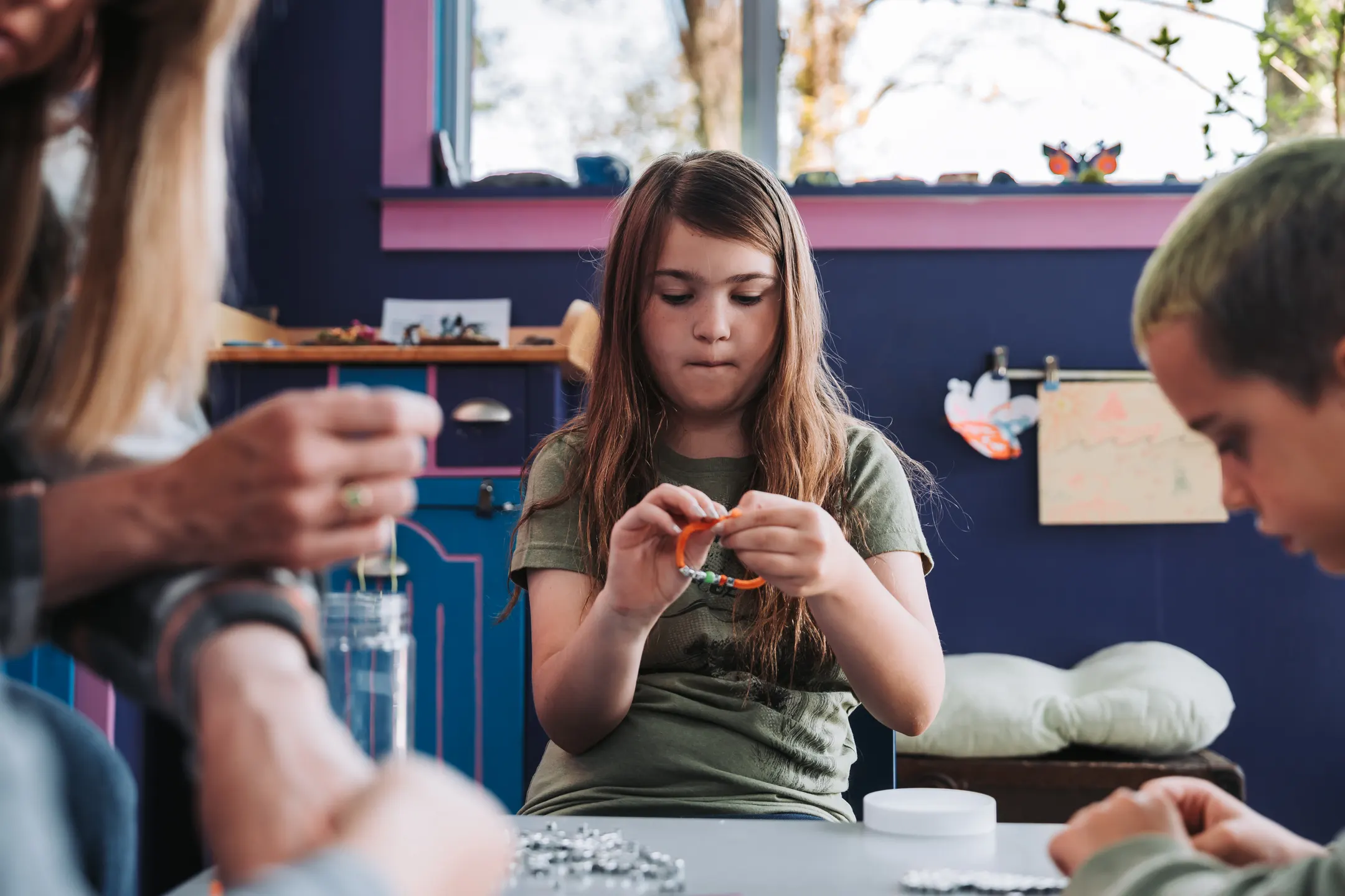 Children working on a hands-on craft project at Dragonwood