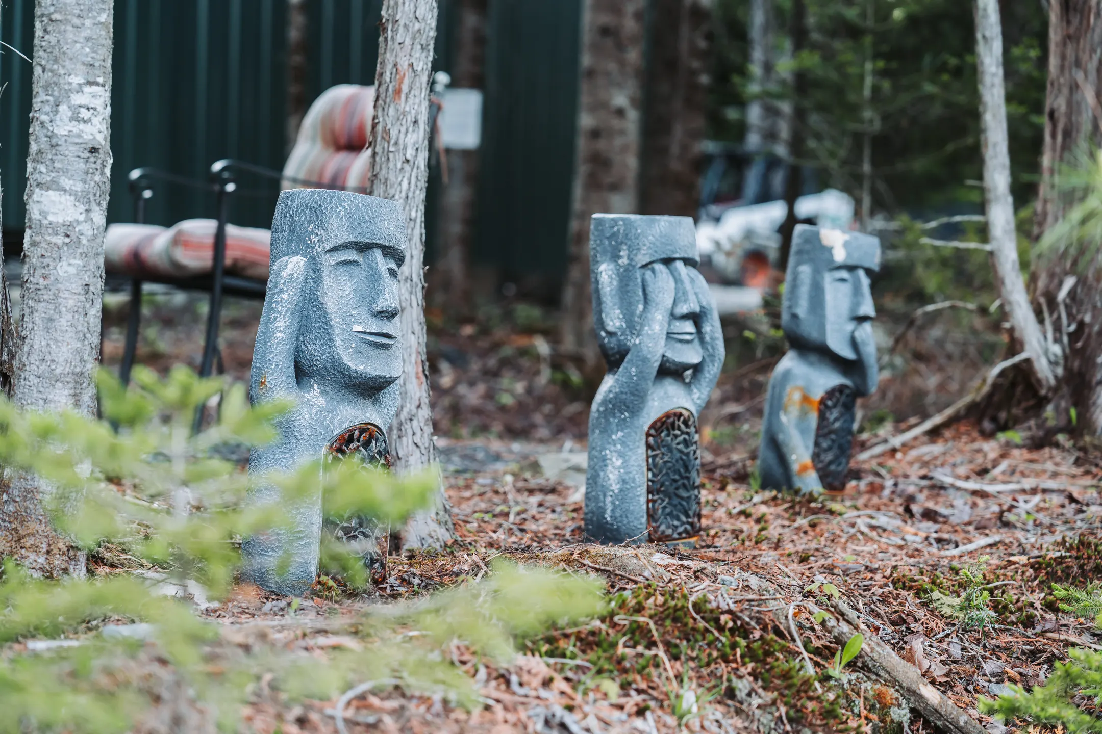 Sculptures nestled among the trees in the meditation garden