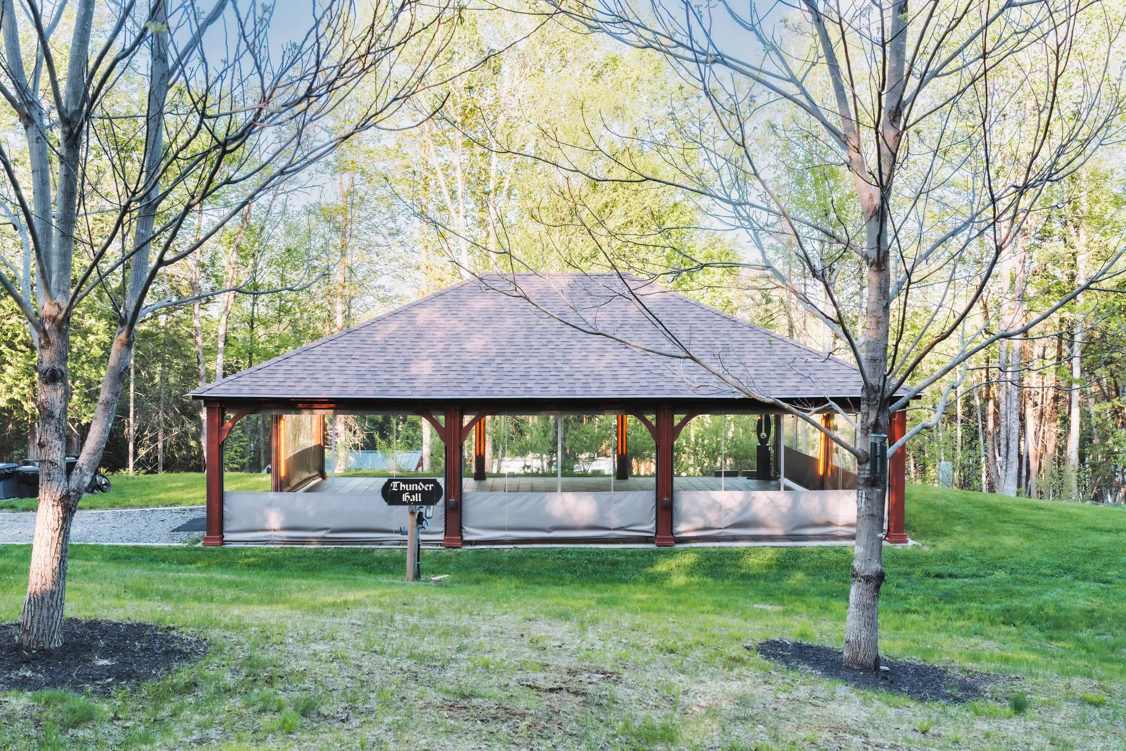 Exterior of Thunder Hall among the trees