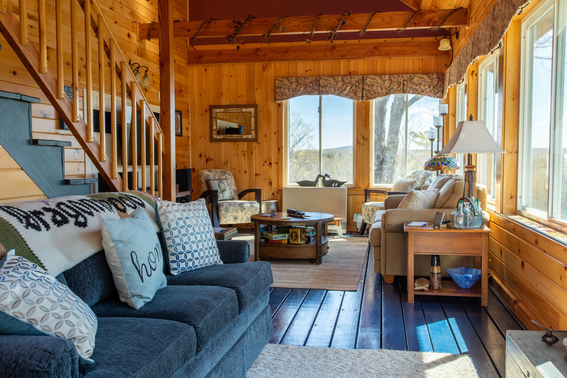 Main House living room with pine ceilings